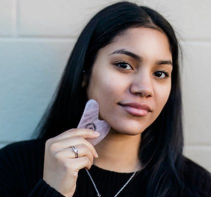 The Benefits of Facial Massage and Gua Sha: Techniques and benefits for improved skin health - True Indigo Spa + Wellness